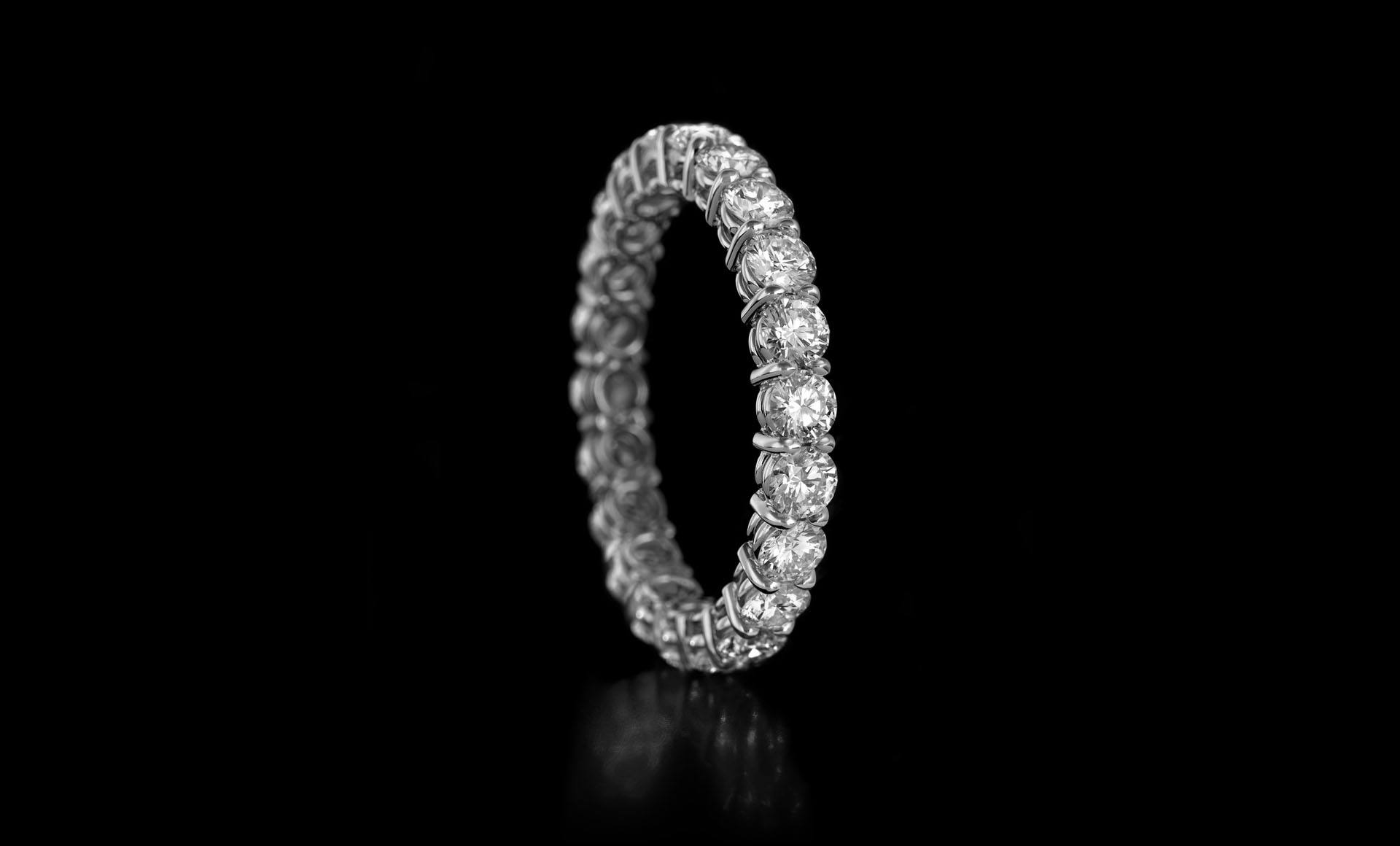 Montluc - Gravity No 1. Infinity ring, full set with diamond according to the classical, ever green prong setting