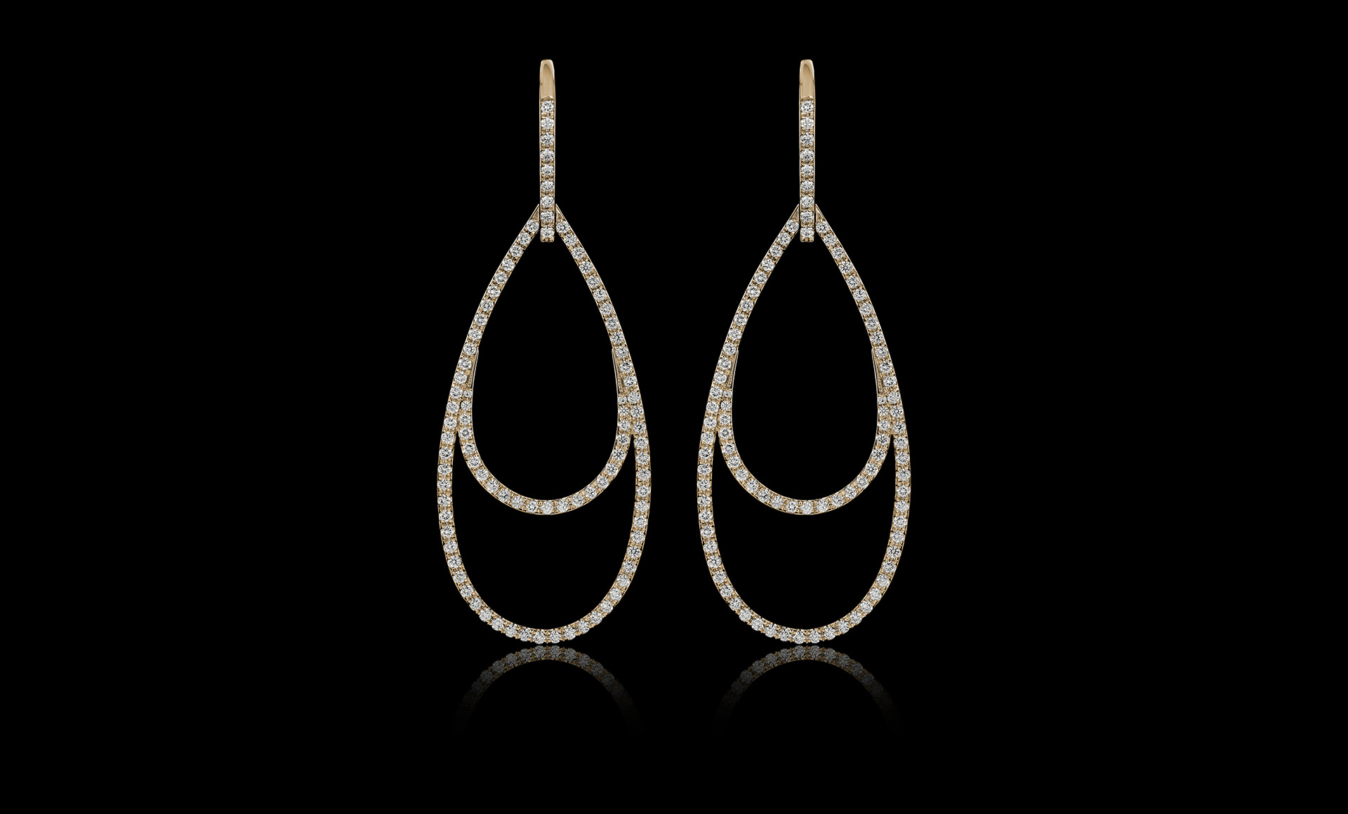 Montluc - Ellipse No.1, a raindrop-shaped diamond earring.