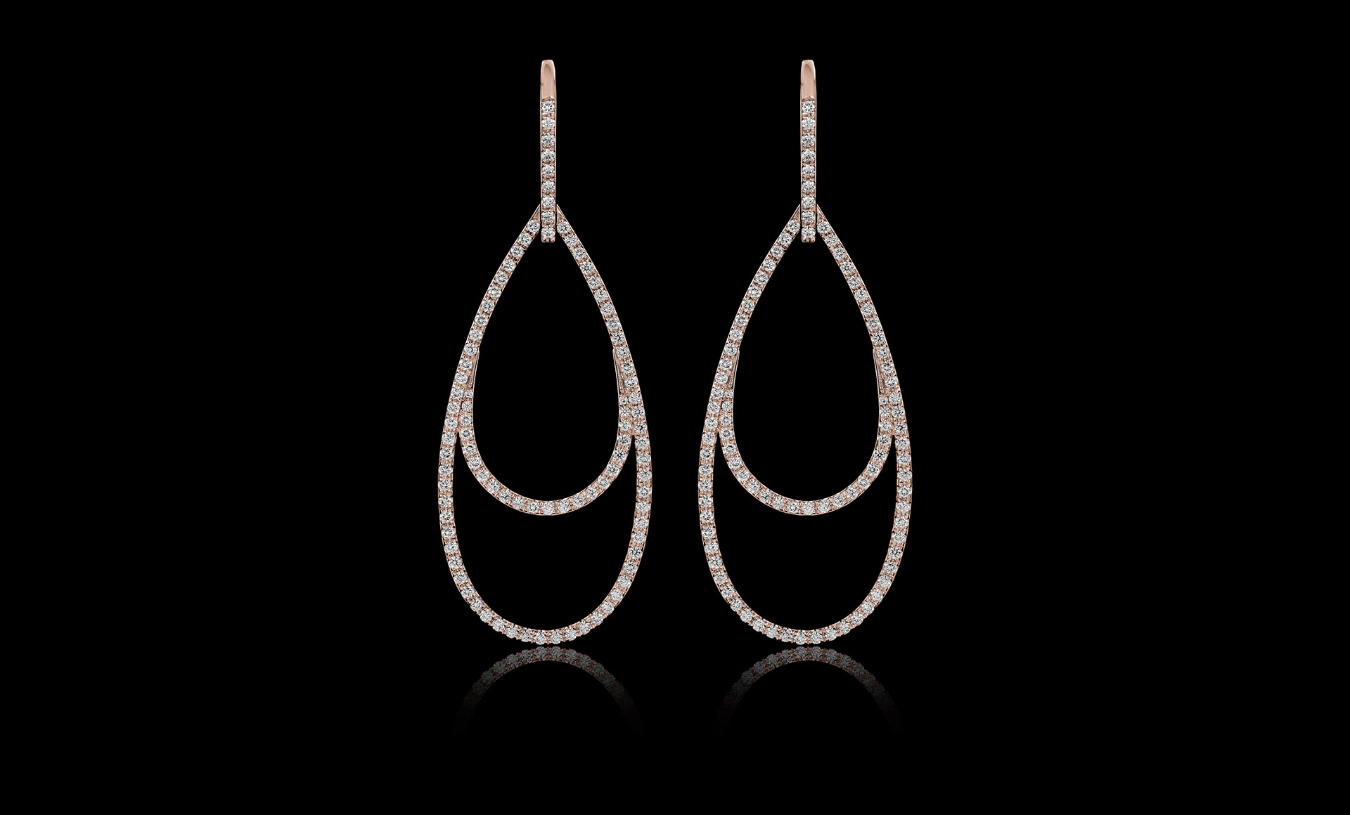 Montluc - Ellipse No.1, a raindrop-shaped diamond earring.