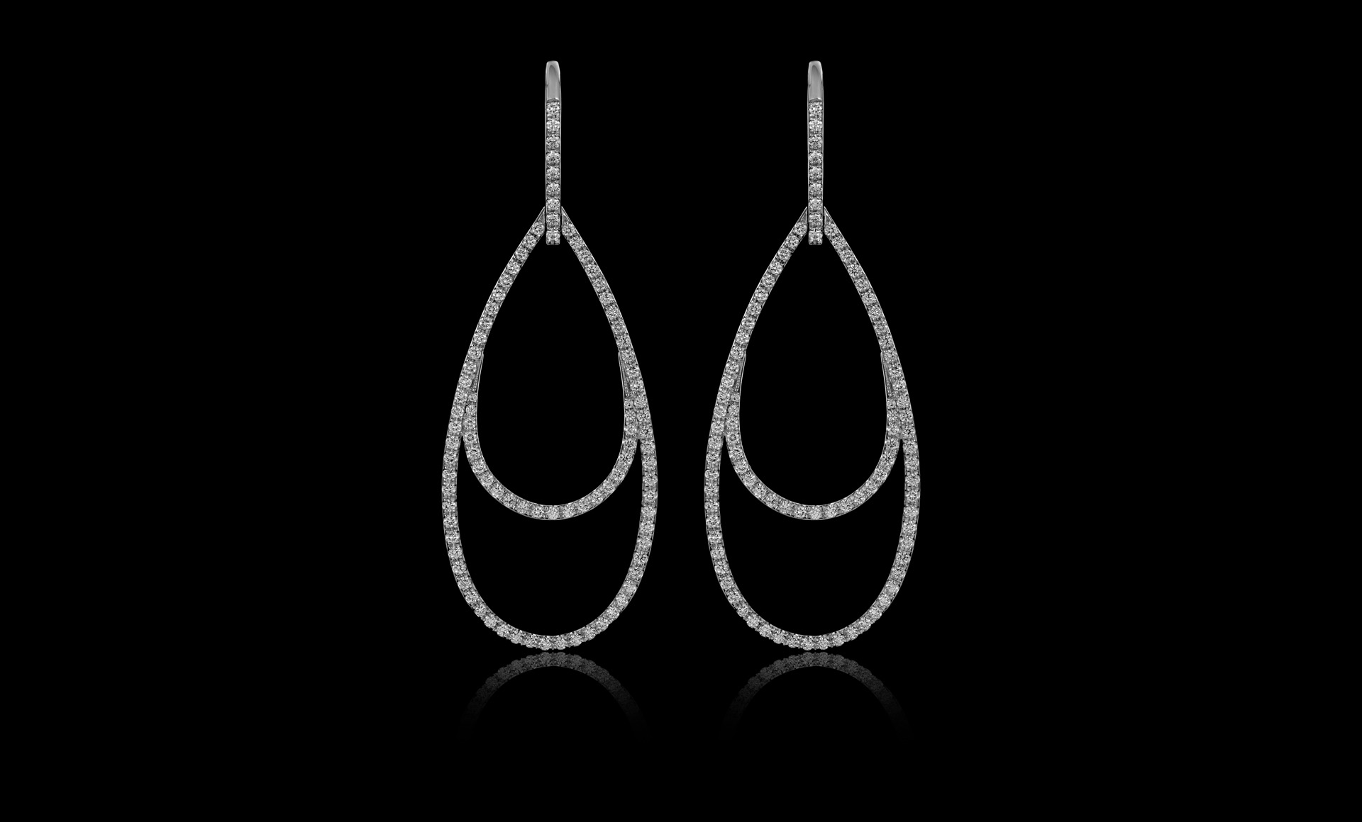 Montluc - Ellipse No.1, a raindrop-shaped diamond earring.